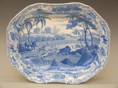 A Spode Indian Sporting Scenes meat plate with underglaze blue script verso 'Driving a Bear out of
