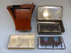 A late 19thC portable stereoscopic viewer together with a quantity of glass and card slides