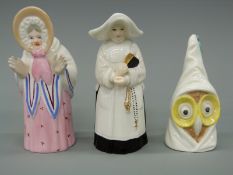 Three candle snuffers, two by Royal Worcester, owl and nun, and another of an old woman, unmarked,