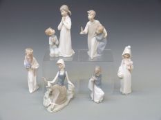 Six Lladro child figures,