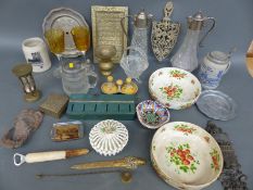 A collection of plated claret jugs, steins,