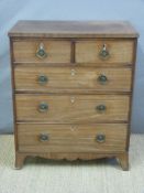 A 19thC mahogany bachelor's chest of two over three graduated drawers raised on bracket feet,