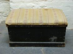 A 19thC stained pine trunk with fabric top,
