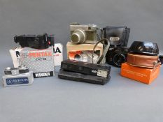 A quantity of cameras to include Carl Zeiss Werra, Hanimex 35mm, Canon A-1 with 1:1.