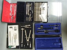 A quantity of technical drawing sets including Technocraft and Proebster sets of screwdrivers etc