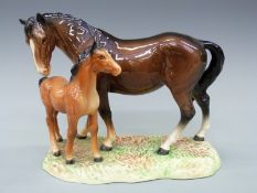 A Beswick mare and foal figure,