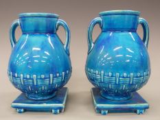 A pair of 19thC Minton Aesthetic Period pedestal twin handled vases impressed Minton, 1287,