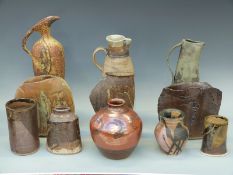 Eleven pieces of studio pottery by Barry Wade to include vases and jugs,