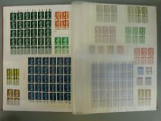 A large collection of GB post office training stamps in a stockbook including George V, QE II,