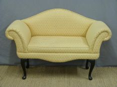 An Edwardian style salon sofa raised on cabriole legs,