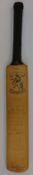 A miniature cricket bat signed by Nottinghamshire and Kent county cricket teams