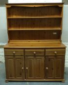 A three drawer pine dresser,