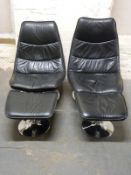 Two modern designer chrome and leather chairs with footstools