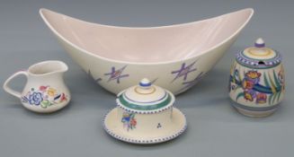 A Poole Pottery dish and three further Poole items