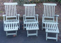 Three teak steamer chairs