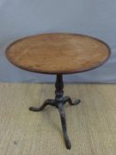 A 19thC mahogany tray/tilt top table on turned support and tripod base,