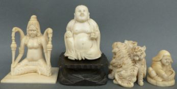 A carved bone figure of three tigers, Meiji period Japanese netsuke,