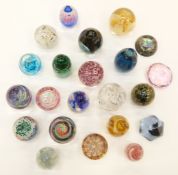 Twenty-three various decorative glass paperweights including Mdina, Caithness,