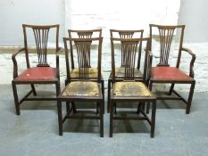 A set of six mahogany Edwardian dining chairs to include two carvers
