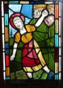 A mid-20thC stained glass window depicting Jill falling down the hill, 46cm x 66cm,