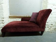 An upholstered chaise longue,