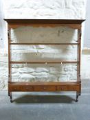 A late 19th/early 20thC oak plate rack, with drawers to base, 2 shelves and scalloped top,