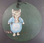 Beatrix Potter unusual wooden circular advertising plaque (c1930) with colour image of Tom Kitten