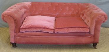 An upholstered button backed Chesterfield style sofa,