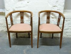 A pair of inlaid Edwardian tub chairs