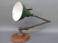 A green enamel machinist's or industrial lamp,