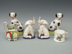 A collection of ceramics including a pair of blanc de chine heron spill vases, Prattware etc,