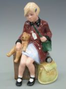 A Royal Doulton limited edition figure 8572/9500 The Girl Evacuee HN3203,