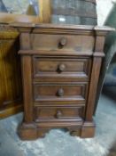 An antique style small chest of four drawers,