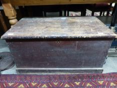 A 19thC stained pine trunk with candle box,