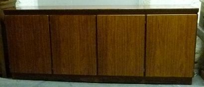 A retro Danish four door Skovby sideboard, probably teak or similar,
