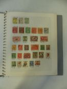 Two blue ring binders of all-world stamps