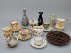 A collection of ceramics including Royal Doulton blush ivory coffee can and other continental