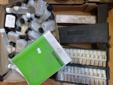 A collection of vintage pill bottles and phials, largely labelled Keene and Ashwell Ltd, London,