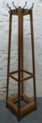 An Arts and Crafts style oak coat/hat stand,
