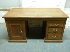 A 19thC oak partners' desk,