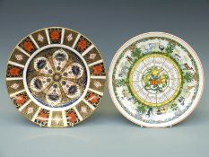 A Royal Crown Derby Imari 1128 pattern cabinet plate and a Wedgwood 1980 Christmas plate
