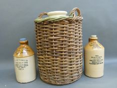 Stoneware flagons for Liverpool, Bolton and Monton, the Liverpool example in cane basket,