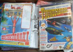 A collection of Thunderbirds and space related magazines,