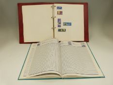 An album containing world stamps together with an empty Stanley Gibbons Collection album and an