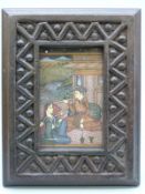 A framed Indian Moghul style miniature on paper of a couple on a balcony,