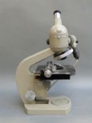 A cased Olympus Tokyo laboratory microscope
