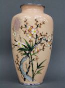 A Japanese cloisonné vase decorated with prunus,