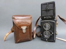 A Rolleiflex TLR camera with Carl Zeiss 1:3.8 f=7.