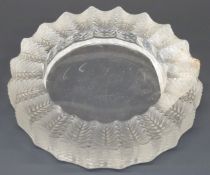 Lalique Jamaica frosted and clear glass ashtray signed to base 'Lalique France', 14cm in diameter.