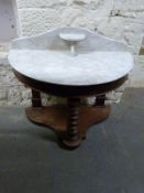 A 19thC bow fronted marble topped washstand or sidetable,